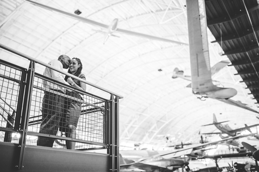 003 black and white of couple at air and space museum engagement session