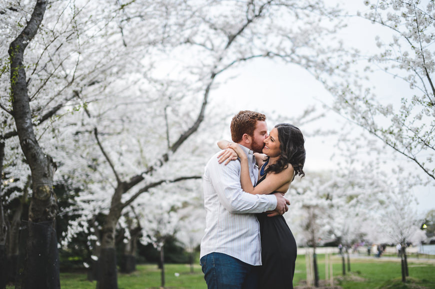 006 Couple embracing in cherry blossom grove