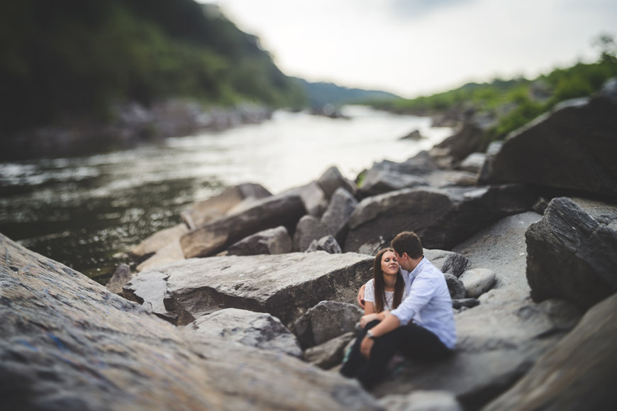 014 couple shares beautiful moment on rocks by the river